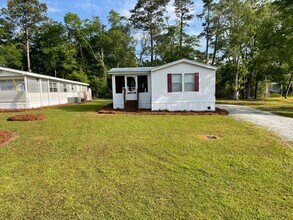 Building Photo - 809 Magnolia Dr