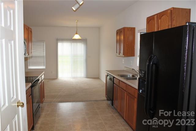 Foto del edificio - 9006 Corey Common Ave