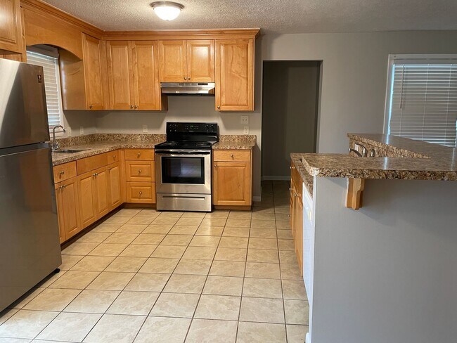 Foto del edificio - Cute 3 Bed 2 Bath with Fenced Yard