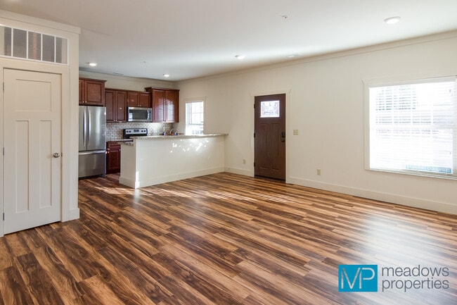 Living Room into Kitchen - Copper Springs by Meadows Properties