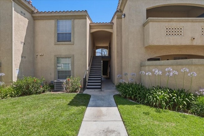 Building Photo - Move-In Ready Condo with Premium Community Amenities