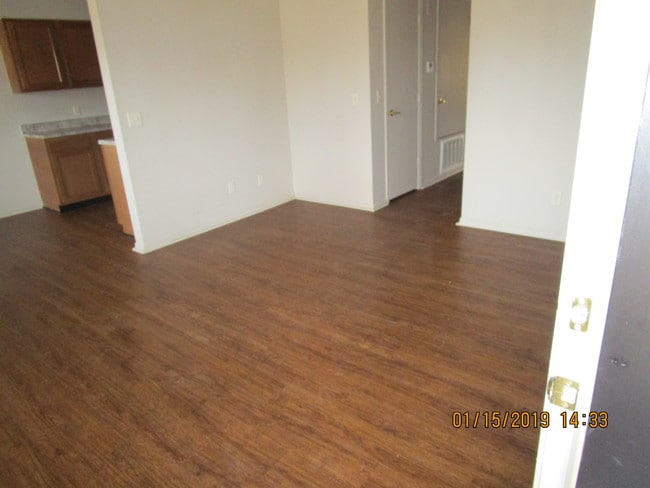 Living Room Brand New Flooring - 400 S E Ave