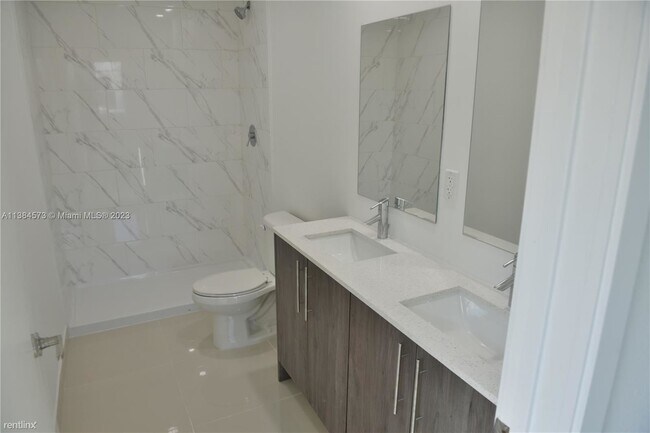 Foto del edificio - 4 br, 4.5 bath House - 1159 NW 1st St