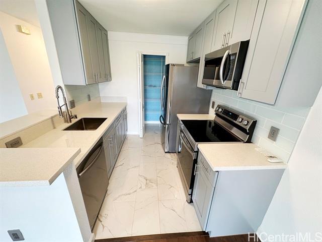 Building Photo - 94-638-638 Lumiaina St