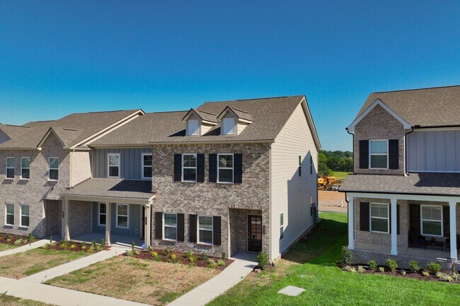 Building Photo - **BRAND NEW 2024-BUILT TOWNHOME IN A RESOR...