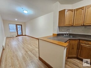 Building Photo - Renovated 1-Bedroom with Balcony | 2nd Floor | Prime Woodside/Sunnyside Location