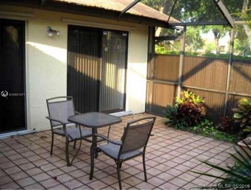 Building Photo - 3998 Cocoplum Cir
