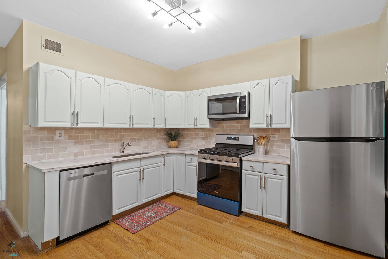 Fully rehab kitchen. Brand new appliances with dishwasher. - 2323 N Albany Ave