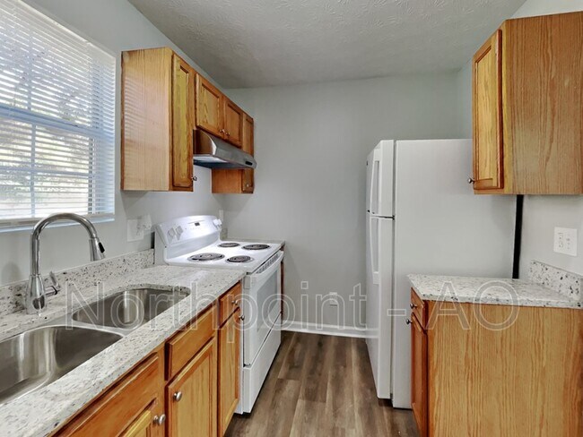 Foto del edificio - 3380 River Run Trail