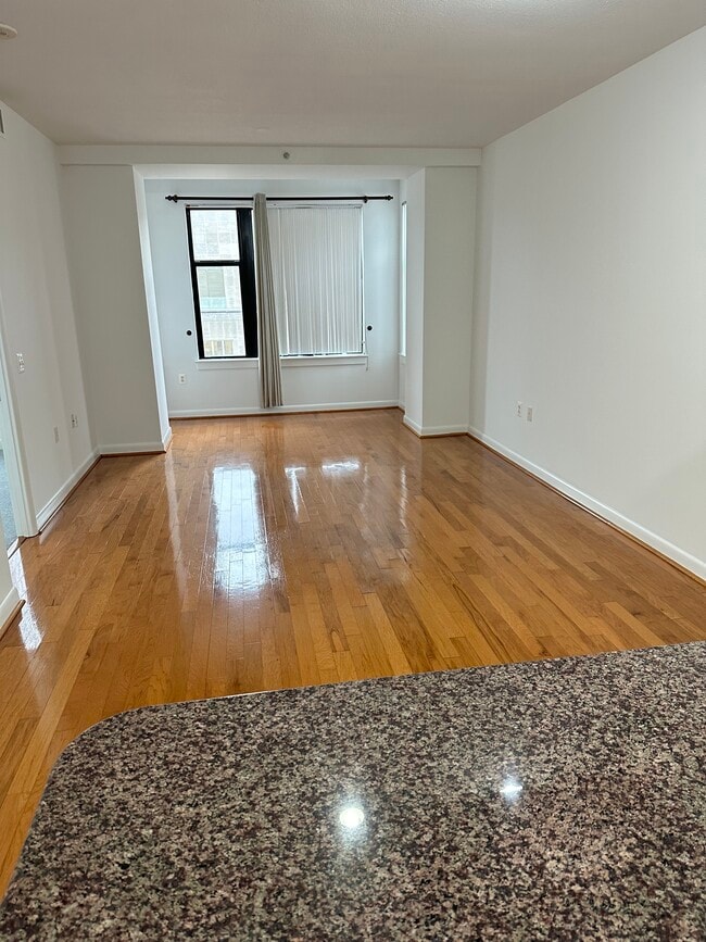 Living area view from Kitchen - 400 Massachusetts Ave NW