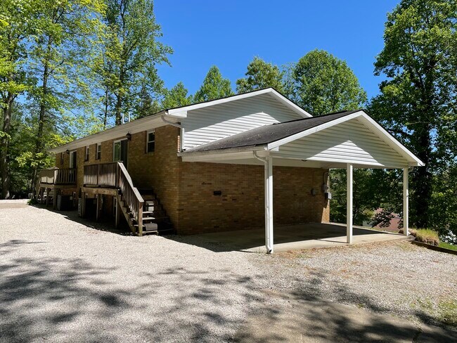 OUTSIDE REAR WITH DECK - 1809 Winding Hills Dr