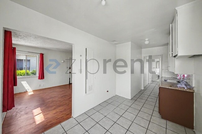 Building Photo - 7027 Holmes Ave