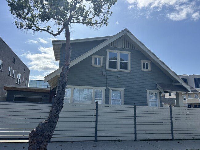 Side view of rental property - 642 E 10th St