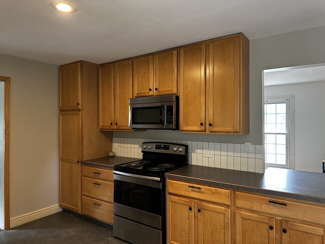 Kitchen (and a peak at the living room) - 6962 Adaside Dr SE