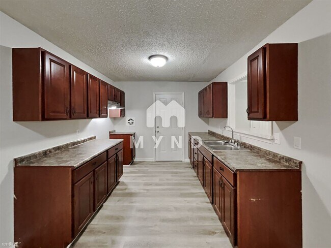 Building Photo - 4 br, 2 bath House - 1617 Butterworth Rd