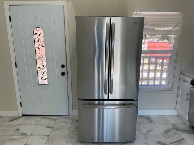 Front door and fridge - 1840 1st St