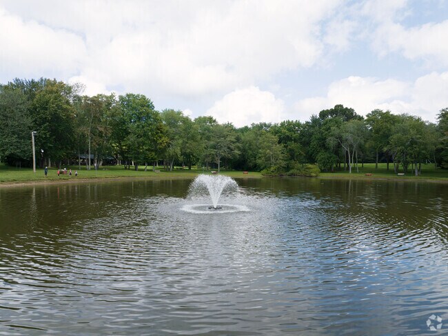 In the center of Heritage Park is a large pond to sit around and enjoy in East Longmeadow.