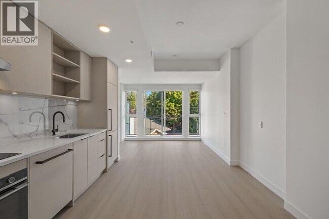 Photo du bâtiment - 422-422 E 3rd St