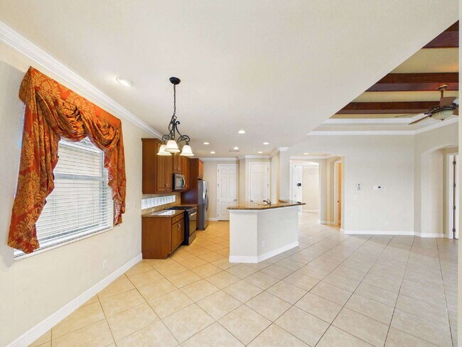 Building Photo - Luxury Lakefront Pool Home in Tesoro - Move-in Ready with Premium Inlcusions