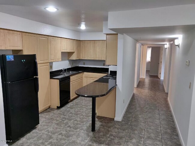Foto del edificio - 1005 E 8th St