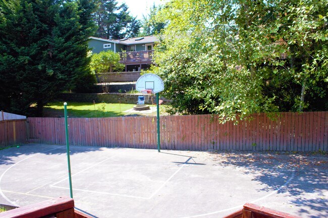 Backyard - partially paved for sports. - 1853 211th Pl NE