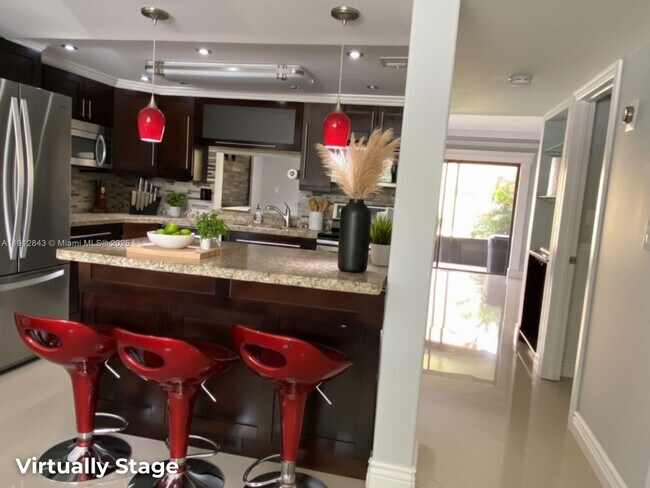 Foto del edificio - 3282 N Pine Island Rd