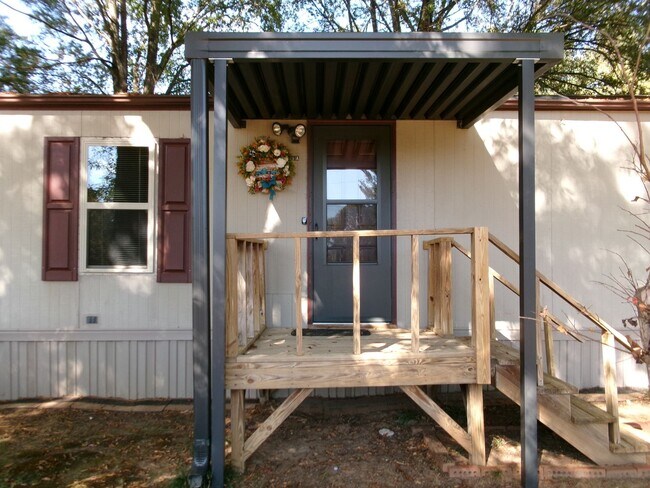 Building Photo - Rural Setting for this Cozy and Comfortabl...
