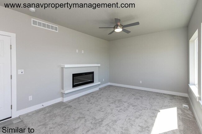 Building Photo - Stunning 4-Bedroom Home with Finished Base...