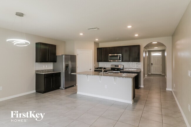 Building Photo - 5876 Arlington River Dr.