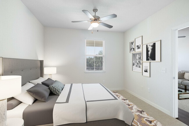 Relax in this elegant bedroom retreat, where modern style meets cozy comfort. - Cortona South Tampa