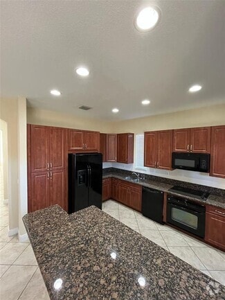 Building Photo - 6965 Julia Gardens Dr