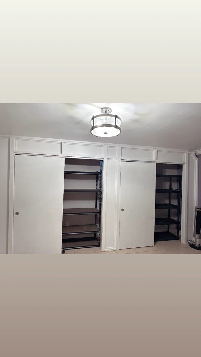 Spacious Living Room closets - 14421 SW 92nd Ter