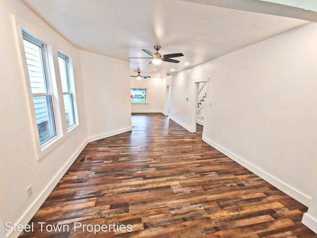 Building Photo - 3 br, 2.5 bath House - 609 E. 14th St.