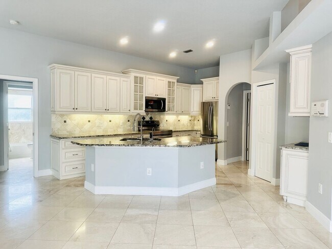 Building Photo - Gorgeous Executive Style pool home in Tarp...