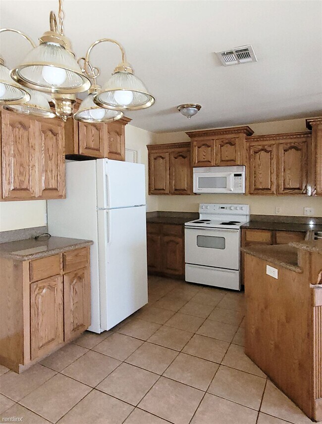 Foto del edificio - 2 br, 2.5 bath 4plex - 1402 W Kiwi Ave 2