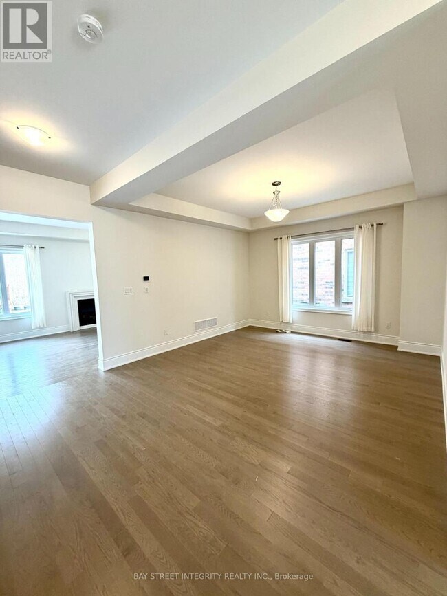 Photo du bâtiment - 64 Bud Leggett Cres