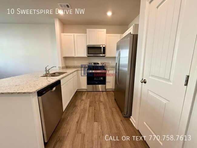 Foto del edificio - 10 Sweetspire Dr NW