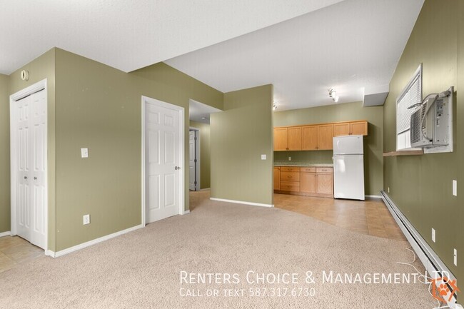 Building Photo - Main Floor 2 bedroom Unit With Onsite laun...