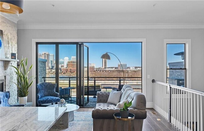 Foto del edificio - Modern Luxury Meets Vibrant Riverfront Living in Manchester - Rooftop Views + Elevator