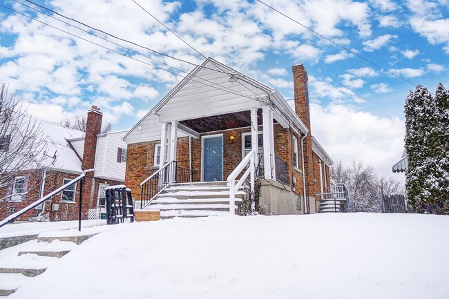 Building Photo - Four Bedroom Available in March!