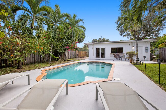 Pool and garden, daytime - 25 NW 95th St