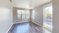 This 540 square foot, one-bedroom apartment in Pomona offers a blend of modern design and practical living. The open-concept layout maximizes the use of space, with a combined kitchen and living area that creates a seamless flow throughout the main living space. The kitchen boasts dark wood cabinetry, stainless steel appliances, and a sleek countertop, providing both style and functionality.

The living area features wood-look flooring and large windows that flood the space with natural light, creating an airy and inviting atmosphere. The bedroom, measuring 170 square feet, offers ample space and is equipped with plush carpeting for comfort underfoot. It also benefits from a large window, ensuring the room remains bright and welcoming.

The bathroom continues the modern aesthetic with a clean design, featuring a large mirror, contemporary fixtures, and a combination bathtub and shower. Throughout the apartment, recessed lighting adds to the overall modern feel while providing adjustable illumination.

Storage solutions are integrated throughout the space, with closets and cabinets helping to maintain a clutter-free environment. The neutral color palette of whites and grays provides a versatile backdrop for personal decorating styles.

This apartment, located at 180 Monterey Ave, B-200 in Pomona, offers an ideal living solution for those seeking a contemporary, low-maintenance home in a convenient urban setting. Its efficient design and modern amenities make it well-suited for young professionals or couples looking for a stylish yet practical living space.