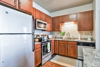 Building Photo - Residences at The Streets of St. Charles Apartment Homes