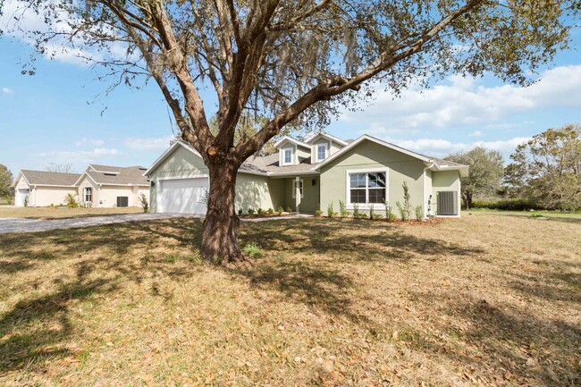 Building Photo - Beautiful Brand New 4/2 Home on 3/4 Acre F...