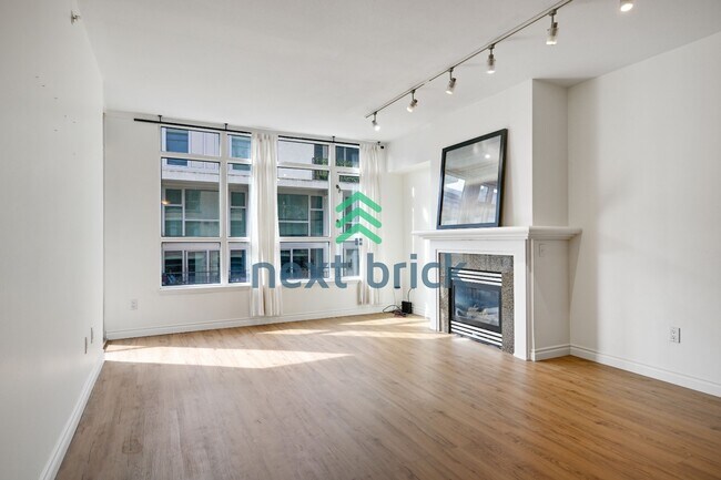 Foto del edificio - "Chic Urban Retreat: Stylish 1-Bedroom Condo in the Heart of Seattle!"
