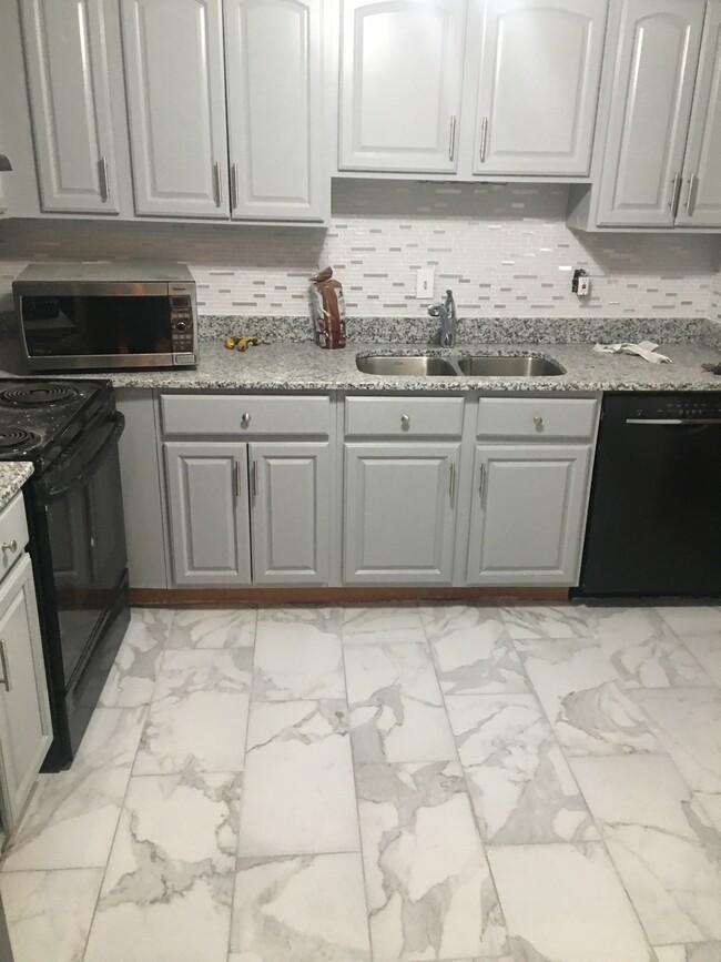 Kitchen: Granite countertops and new tiles - 9200 Edwards Way