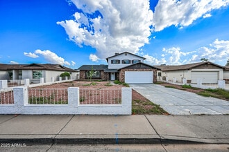 Building Photo - 5761 W Cholla St