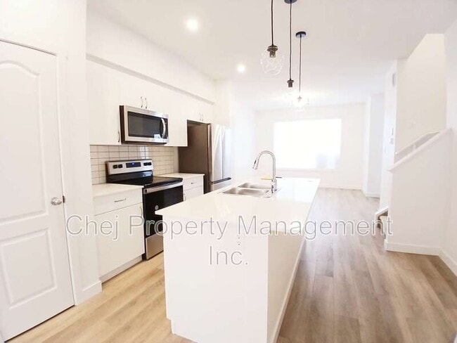 Photo du bâtiment - 1918-1209 209 St NW