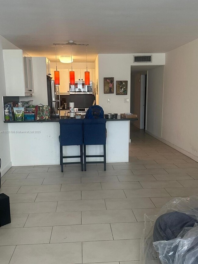 Building Photo - 10230 Collins Ave