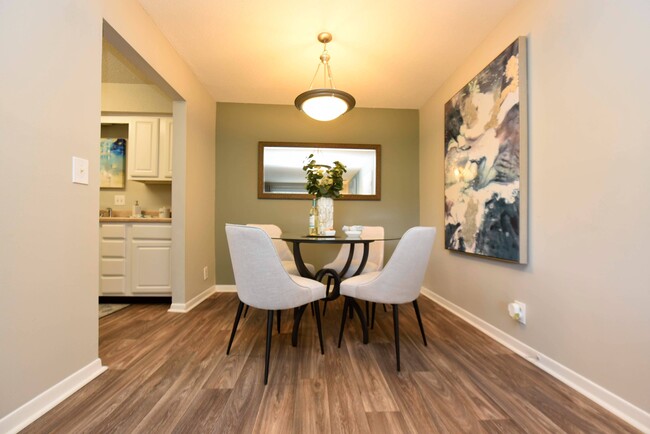 Dining Room + Hardwood Style Flooring - Brookhaven Apartments